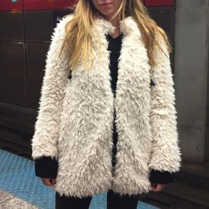 White artificial fur coat